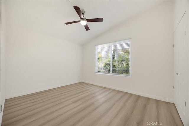 15352 Pastrana Dr, La Mirada, CA 90638 - empty room featuring lofted ceiling, light wood finished floors, and ceiling fan