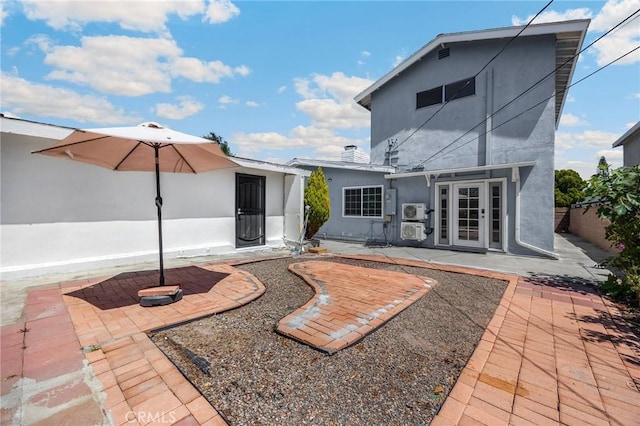 15352 Pastrana Dr, La Mirada, CA 90638 - back of property with a patio and stucco siding