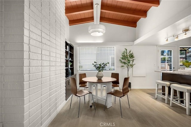 15352 Pastrana Dr, La Mirada, CA 90638 - dining room featuring light wood-style flooring, wooden ceiling, and healthy amount of natural light
