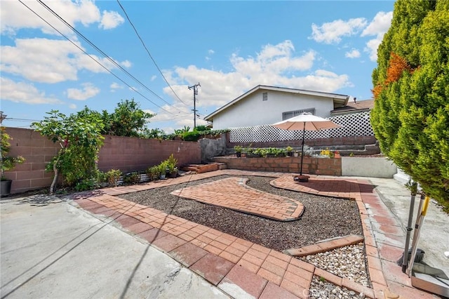 15352 Pastrana Dr, La Mirada, CA 90638 - fenced backyard featuring a patio