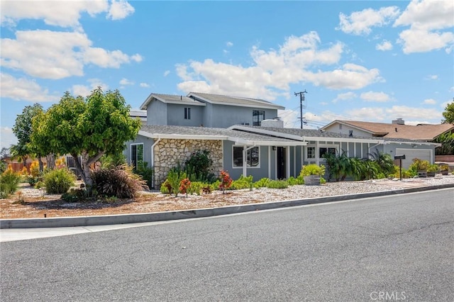 15352 Pastrana Dr, La Mirada, CA 90638 - view of front of home featuring stone siding and stucco siding