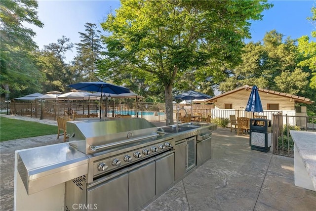 32641 Womsi Rd, Pauma Valley, CA 92061 - view of patio / terrace with an outdoor kitchen and a sink