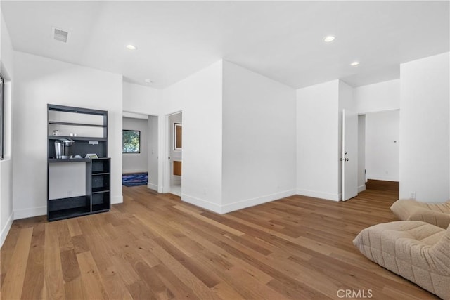 32641 Womsi Rd, Pauma Valley, CA 92061 - unfurnished living room featuring wood finished floors and recessed lighting