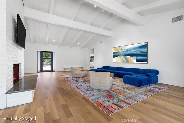 32641 Womsi Rd, Pauma Valley, CA 92061 - living room with wood finished floors and a fireplace