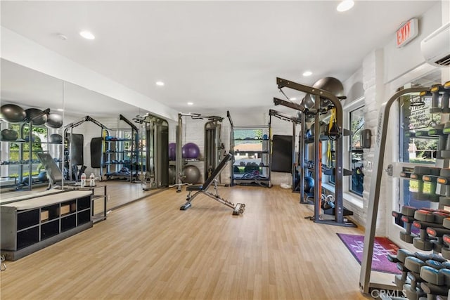 32641 Womsi Rd, Pauma Valley, CA 92061 - workout area featuring an AC wall unit, wood finished floors, and recessed lighting