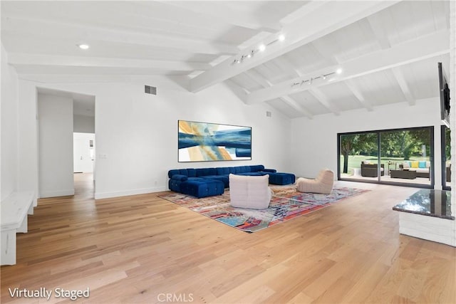 32641 Womsi Rd, Pauma Valley, CA 92061 - living room with rail lighting and light wood finished floors