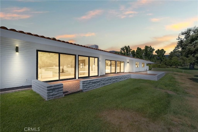 32641 Womsi Rd, Pauma Valley, CA 92061 - back of house featuring a lawn