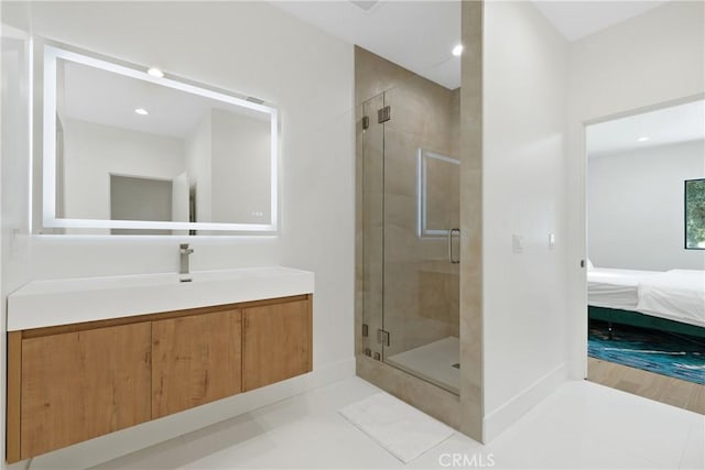 32641 Womsi Rd, Pauma Valley, CA 92061 - ensuite bathroom featuring vanity, a stall shower, tile patterned floors, and recessed lighting