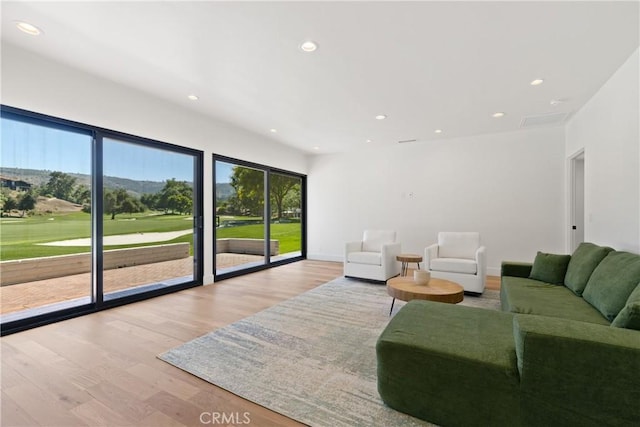 32641 Womsi Rd, Pauma Valley, CA 92061 - living room with wood finished floors, recessed lighting, and view of golf course