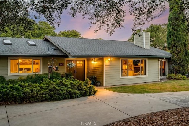 947 Calimex, Nipomo, CA 93444 - single story home with a chimney, a shingled roof, and a lawn