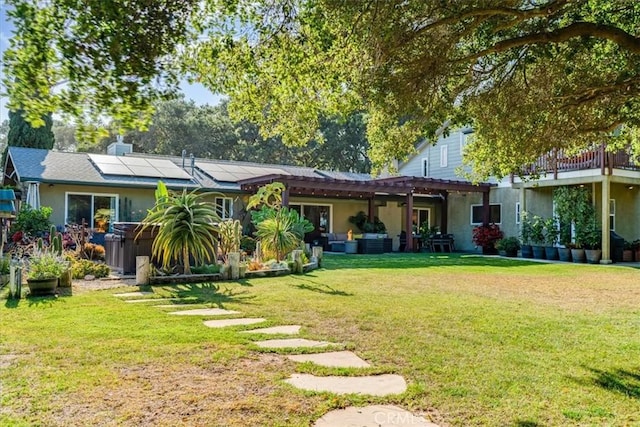 947 Calimex, Nipomo, CA 93444 - back of house with solar panels, a yard, and stucco siding