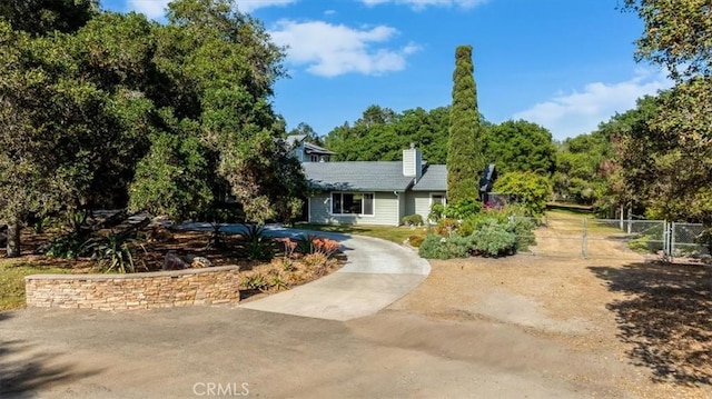 947 Calimex, Nipomo, CA 93444 - view of front of house featuring a gate and a chimney