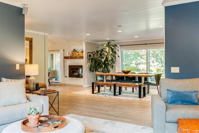 947 Calimex, Nipomo, CA 93444 - living area with wood finished floors, crown molding, a fireplace, and recessed lighting