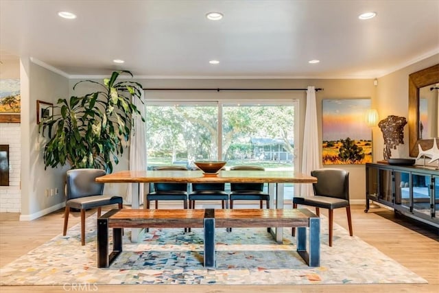 947 Calimex, Nipomo, CA 93444 - dining space featuring ornamental molding, light wood-style flooring, a fireplace, and recessed lighting