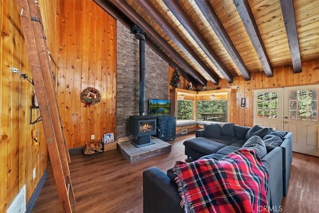 33211 Juniper Ln, Green Valley Lake, CA 92341 - living room featuring wooden ceiling, a wood stove, wood finished floors, and wooden walls