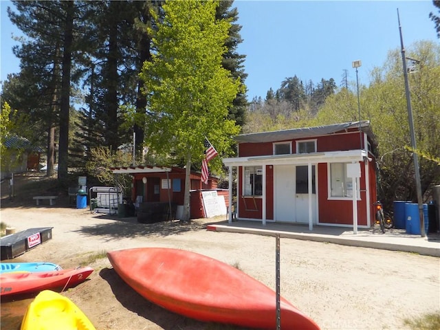 33211 Juniper Ln, Green Valley Lake, CA 92341 - rear view of property featuring an outdoor structure