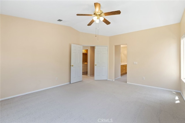23832 Matador Way, Murrieta, CA 92562 - unfurnished bedroom with light carpet, lofted ceiling, and a ceiling fan