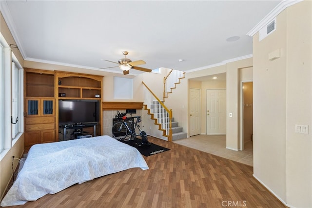 23832 Matador Way, Murrieta, CA 92562 - bedroom featuring wood finished floors and crown molding