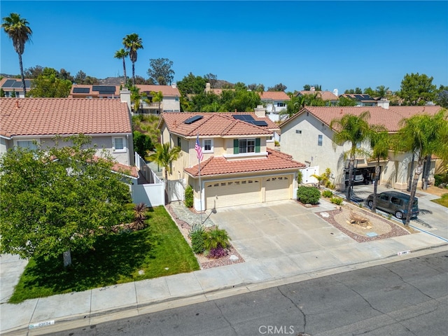 23832 Matador Way, Murrieta, CA 92562 - view of front of property featuring a tiled roof, a residential view, stucco siding, and concrete driveway