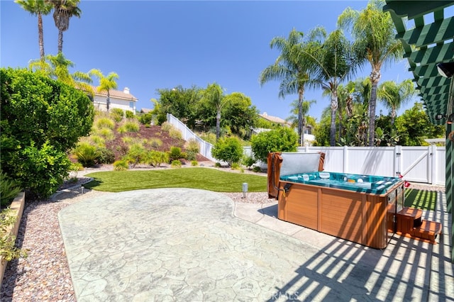 23832 Matador Way, Murrieta, CA 92562 - fenced backyard featuring a hot tub, a patio, and a gate