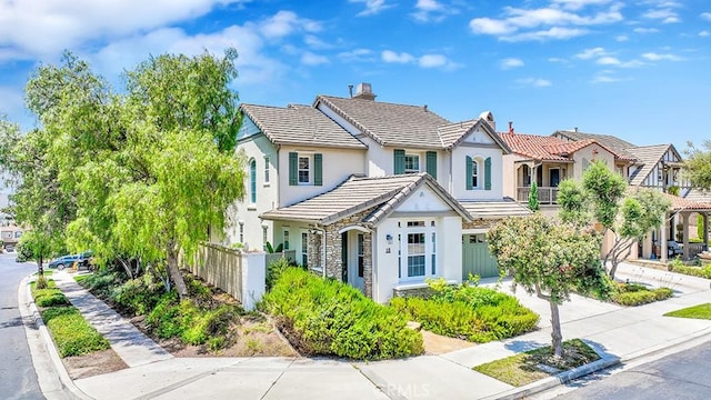 18 Via Canero, San Clemente, CA 92673 - view of front of house featuring a chimney, a tiled roof, and stucco siding
