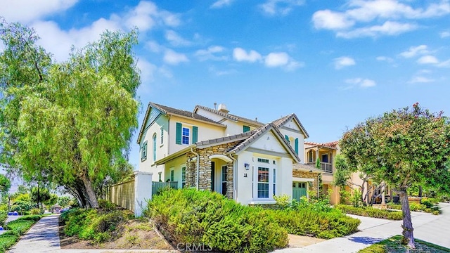 18 Via Canero, San Clemente, CA 92673 - view of front facade featuring stucco siding and stone siding