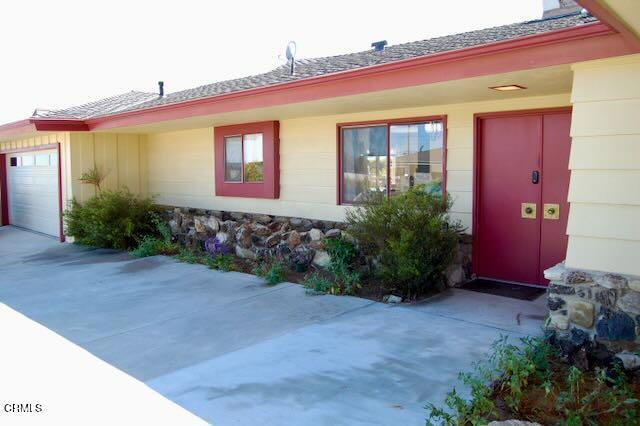691 Via Ondulando, Ventura, CA 93003 - doorway to property featuring an attached garage and driveway