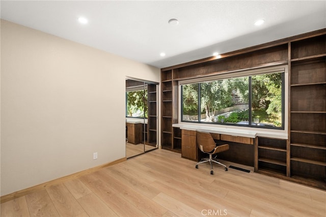 325 N Madison Ave, Monrovia, CA 91016 - unfurnished office with light wood finished floors, built in desk, recessed lighting, and plenty of natural light