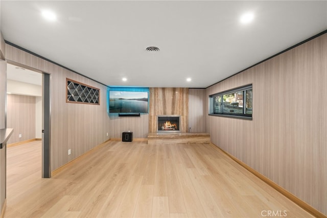 325 N Madison Ave, Monrovia, CA 91016 - unfurnished living room with light wood-style floors and a fireplace