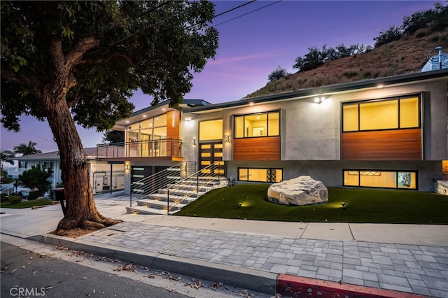 325 N Madison Ave, Monrovia, CA 91016 - view of front facade featuring a lawn and stucco siding