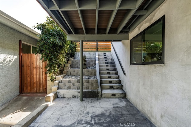 325 N Madison Ave, Monrovia, CA 91016 - property entrance with stucco siding and a patio