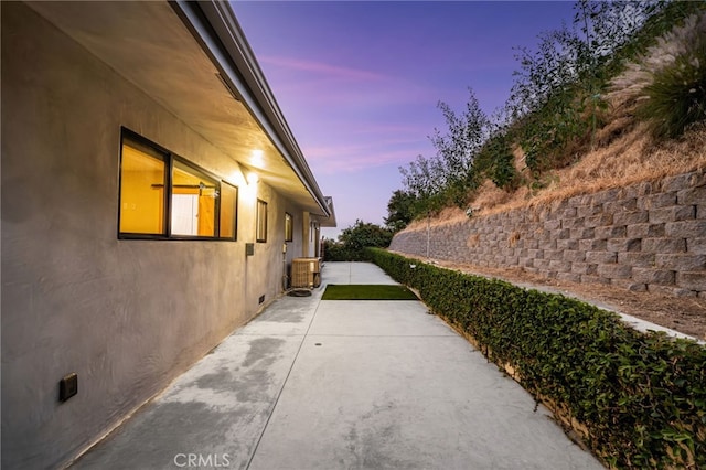 325 N Madison Ave, Monrovia, CA 91016 - property exterior at dusk featuring a patio and stucco siding