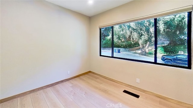 325 N Madison Ave, Monrovia, CA 91016 - empty room with baseboards and light wood-style flooring
