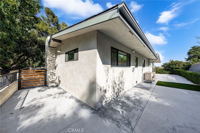 325 N Madison Ave, Monrovia, CA 91016 - view of side of property featuring stucco siding and a patio area