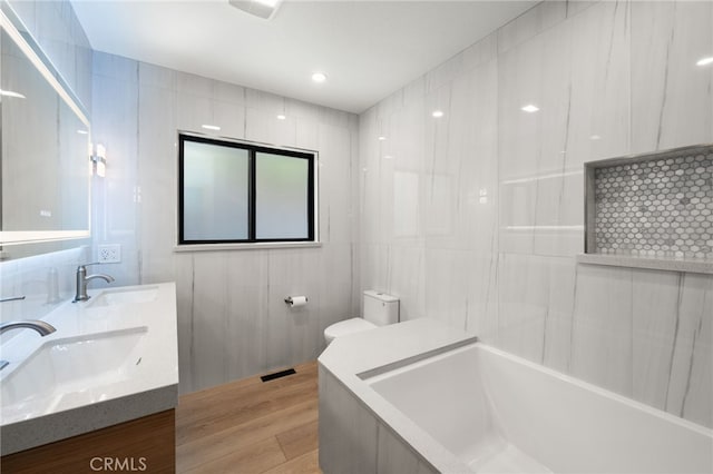 325 N Madison Ave, Monrovia, CA 91016 - full bath with a bathtub, double vanity, and wood finished floors