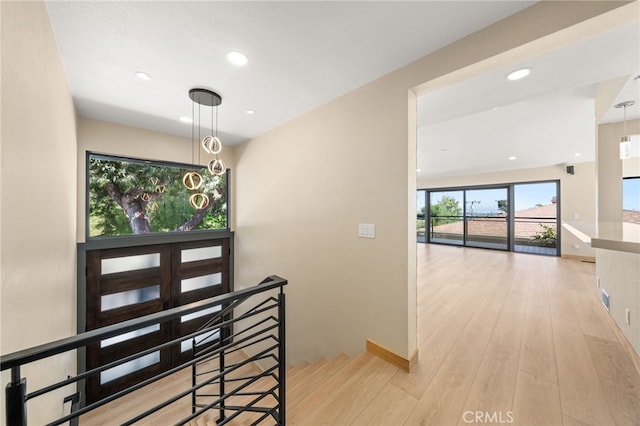 325 N Madison Ave, Monrovia, CA 91016 - foyer with light wood-style floors and recessed lighting