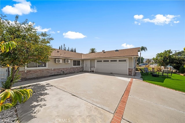 18536 Mescal St, Rowland Heights, CA 91748 - view of front of house with a garage, concrete driveway, a front yard, and brick siding