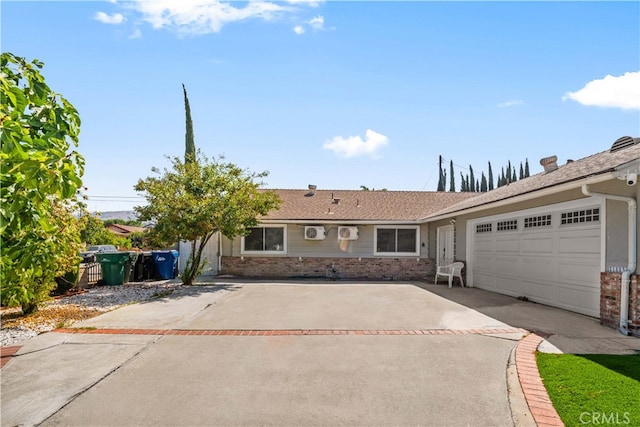 18536 Mescal St, Rowland Heights, CA 91748 - ranch-style home featuring concrete driveway, brick siding, and an attached garage