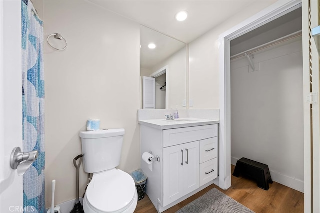 18536 Mescal St, Rowland Heights, CA 91748 - full bath with vanity, wood finished floors, recessed lighting, and a walk in closet