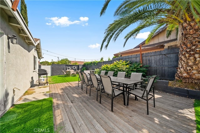 18536 Mescal St, Rowland Heights, CA 91748 - deck with outdoor dining area, a fenced backyard, and a grill