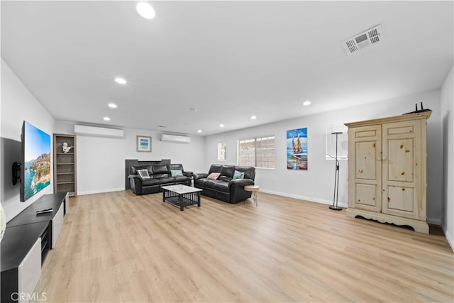 18536 Mescal St, Rowland Heights, CA 91748 - living area with a wall mounted AC, a wall unit AC, recessed lighting, and light wood-type flooring
