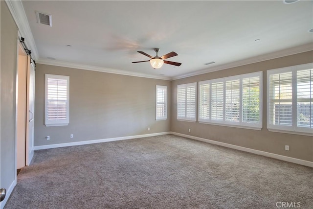 27974 Garda Ct, Menifee, CA 92585 - spare room featuring ornamental molding, healthy amount of natural light, a ceiling fan, and carpet floors
