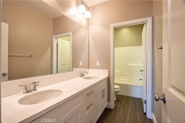 27974 Garda Ct, Menifee, CA 92585 - bathroom with double vanity, wood finished floors, and shower / bath combination