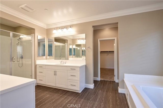 27974 Garda Ct, Menifee, CA 92585 - full bath with a shower stall, crown molding, vanity, wood finished floors, and a bath