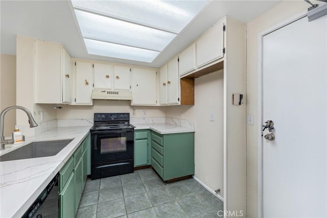 2321 S Magnolia Ave Unit 6E, Ontario, CA 91762 - kitchen featuring black appliances, under cabinet range hood, green cabinets, light stone counters, and light tile patterned flooring