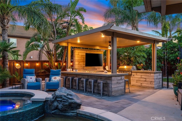 14131 Apple Grove Ct, Eastvale, CA 92880 - view of patio / terrace featuring an in-ground hot tub, a gazebo, and area for grilling