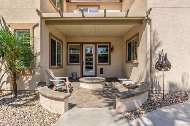 14131 Apple Grove Ct, Eastvale, CA 92880 - view of patio featuring a fire pit