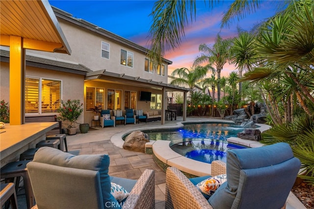 14131 Apple Grove Ct, Eastvale, CA 92880 - view of swimming pool with outdoor lounge area, a patio, and a pool with connected hot tub