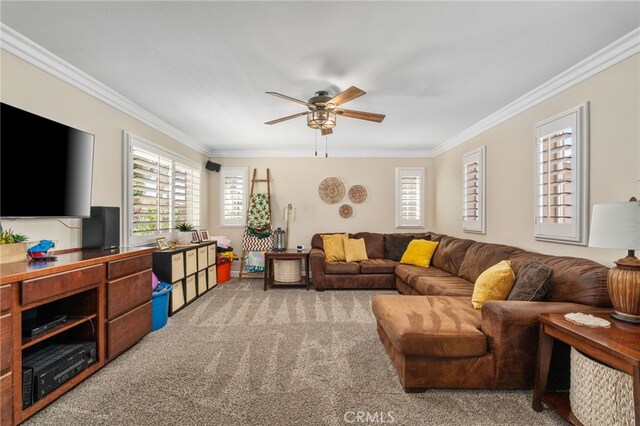 14131 Apple Grove Ct, Eastvale, CA 92880 - living area featuring crown molding, ceiling fan, and light colored carpet