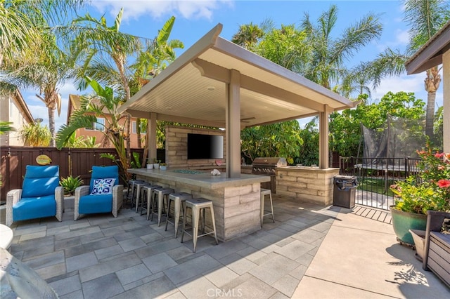 14131 Apple Grove Ct, Eastvale, CA 92880 - view of patio / terrace with exterior bar, a gazebo, and exterior kitchen